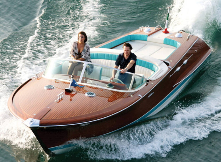 Classic wooden boat on water.